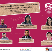 Group of diverse students holding posters promoting healthy eating, mental well-being, and NCD prevention