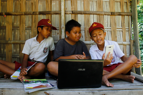 Children playing with their phone