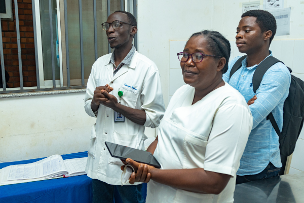 Nurse, doctor and Naasson Nduwamungu,, Rwanda NCD Alliance