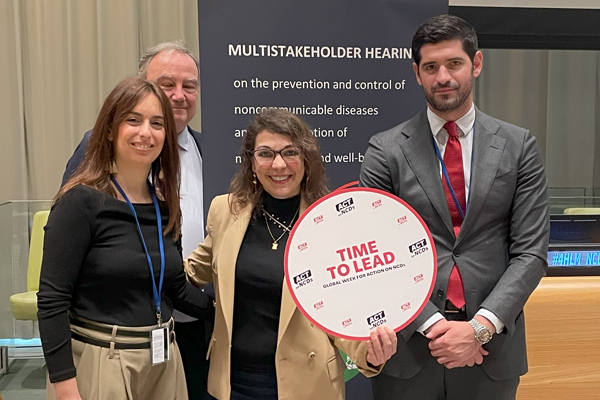 Spanish people smiling at a UN meeting on NCDs