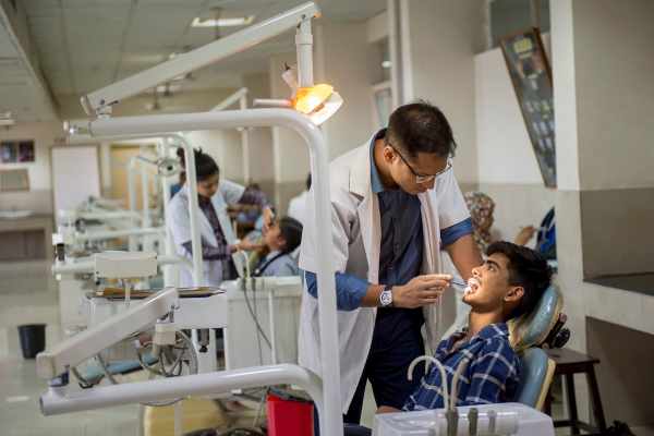 A man being examined by a dentist 